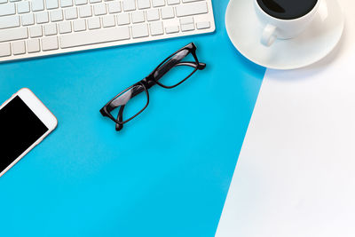 High angle view of coffee cup on table