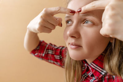 Close-up portrait of young woman