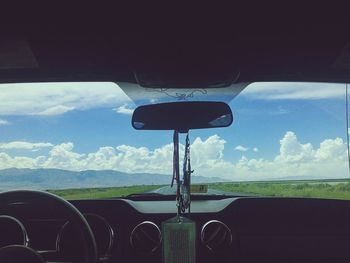 Vintage car against sky