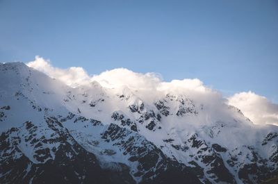 Low angle view of mountains against sky