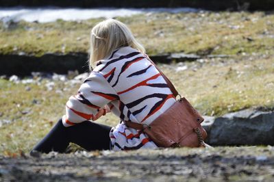 Woman enjoys april in the park