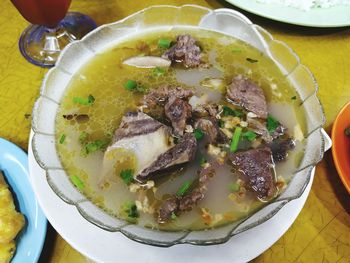 High angle view of soup in bowl on table