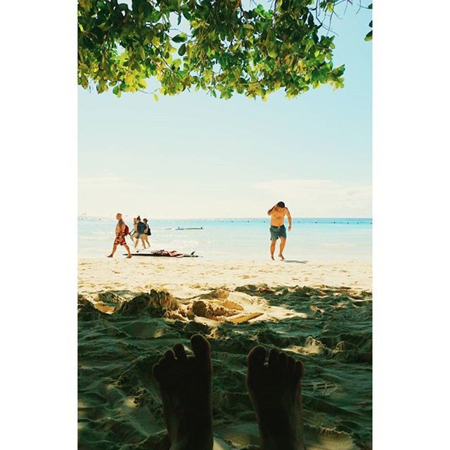 water, sea, transfer print, lifestyles, leisure activity, men, horizon over water, beach, auto post production filter, person, togetherness, vacations, nature, beauty in nature, shore, standing, scenics, sky