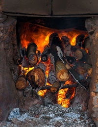 High angle view of fire on wood