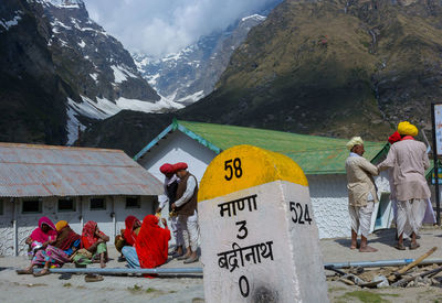 Group of people on snow covered mountain