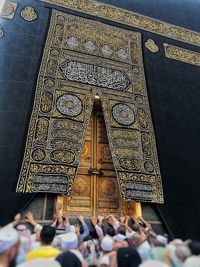 Group of people in temple outside building