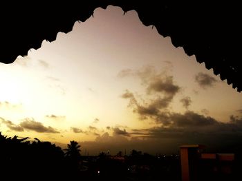 Low angle view of cloudy sky at dusk