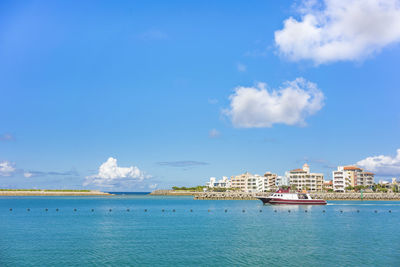 Inflatable slide for water sports, jet ski and motor boating in hamakawa fishing port in okinawa.