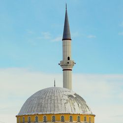 Low angle view of church against blue sky