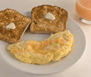 Close-up of breakfast served on table