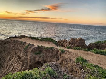 Scenic view of sea against sky during sunset