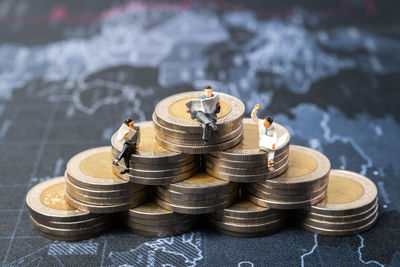 High angle view of coins on table