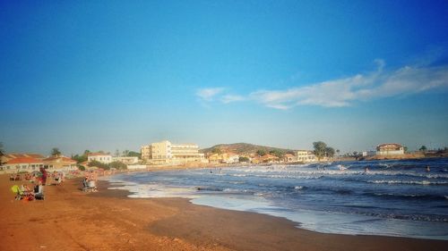 View of beach against cloudy sky