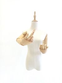 Close-up of hanging over white background