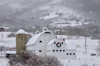 View of town on snow covered landscape