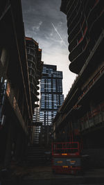 Low angle view of buildings against sky in city