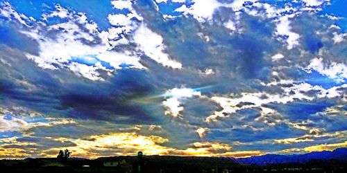 Low angle view of dramatic sky during sunset