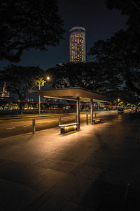Illuminated street and buildings at night