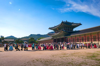 Group of people in front of building