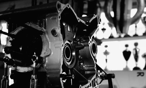 Low angle view of motorcycle engine at workshop