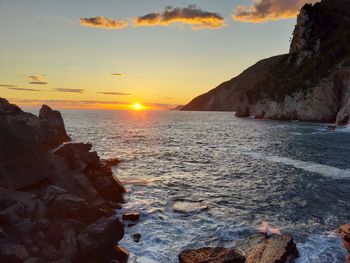 Scenic view of sea against sky during sunset