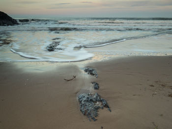 Scenic view of beach against sky