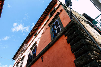 Low angle view of old building against sky