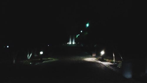 Illuminated street lights at night