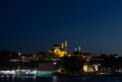 Illuminated city at night suleymaniye mosque