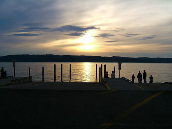 Scenic view of lake at sunset