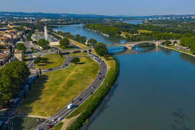 High angle view of river amidst buildings in city