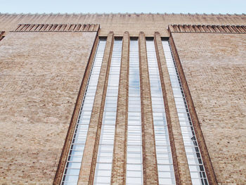 Low angle view of old building against clear sky