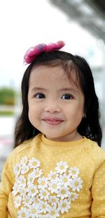 Portrait of cute girl smiling