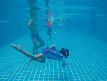 Woman swimming in pool