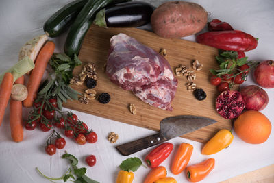 High angle view of vegetables on cutting board