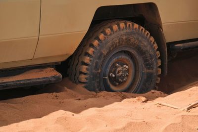 Lower section of a tourist vehicle stuck in the sand at chalbi desert in marsabit county, kenya