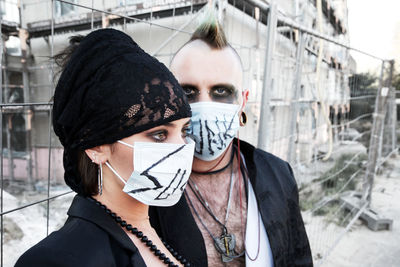 Portrait of young man standing outdoors