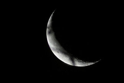 Low angle view of moon against clear sky