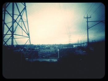 View of power lines against sky