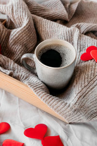 High angle view of coffee cup on table