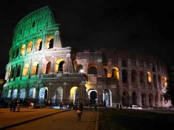 Low angle view of historical building at night