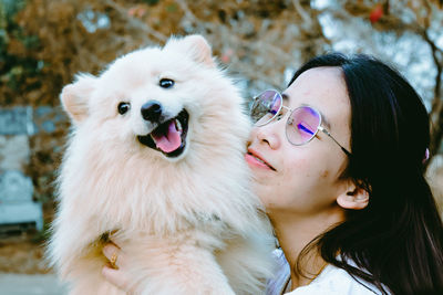 Portrait of woman with dog