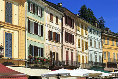 Residential buildings against sky in city