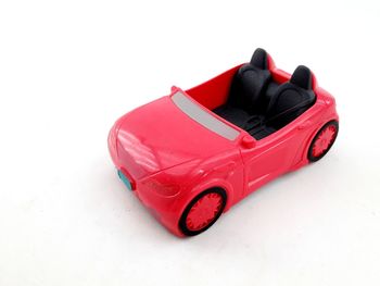 Close-up of toy car against white background