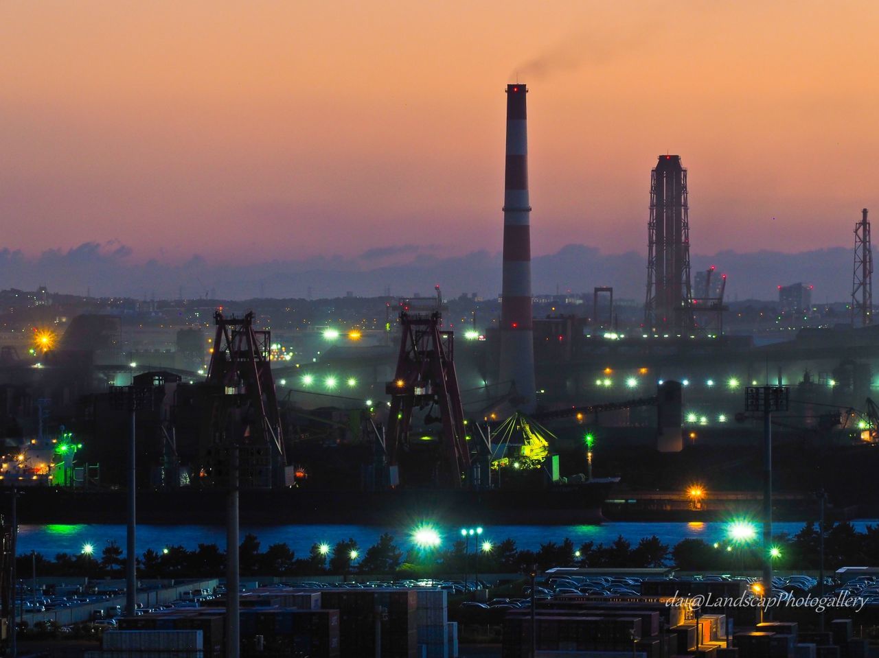 FACTORY AGAINST SKY AT NIGHT