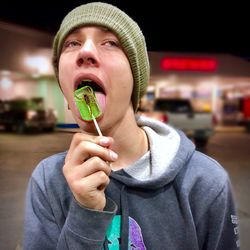 Portrait of man holding ice cream