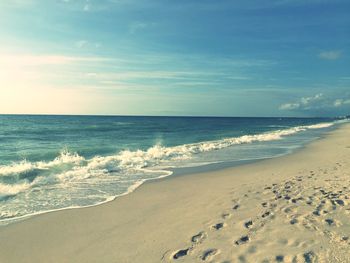 Scenic view of beach against sky