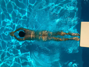 Man swimming in sea