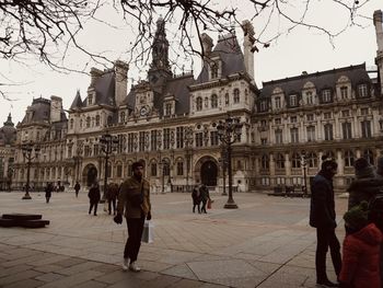 Group of people in front of building