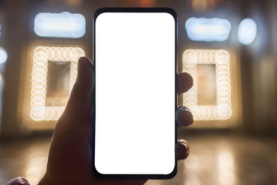 Close-up of person using mobile phone